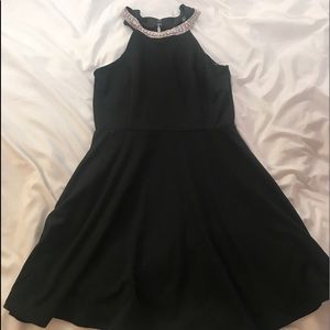 Black dress with jewel neckline